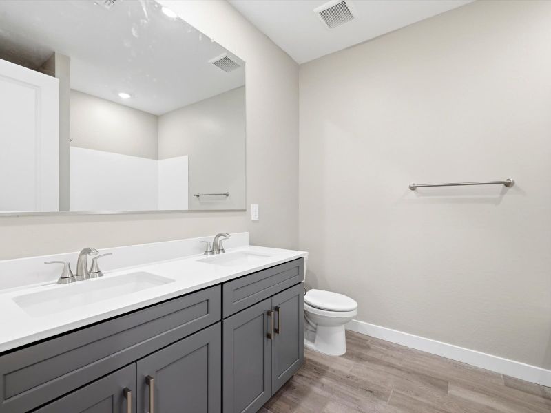 Furnished interior view inside a new home in Blossom Rock Signature Series, Apache Junction (Image 9). Furnished interior view inside a new home in Blossom Rock Signature Series, Apache Junction (Image 9).