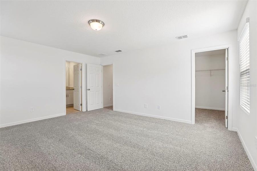 Spacious, unfurnished interior of a new home in The Meadow at Crossprairie Townes, St. Cloud (Image 20).