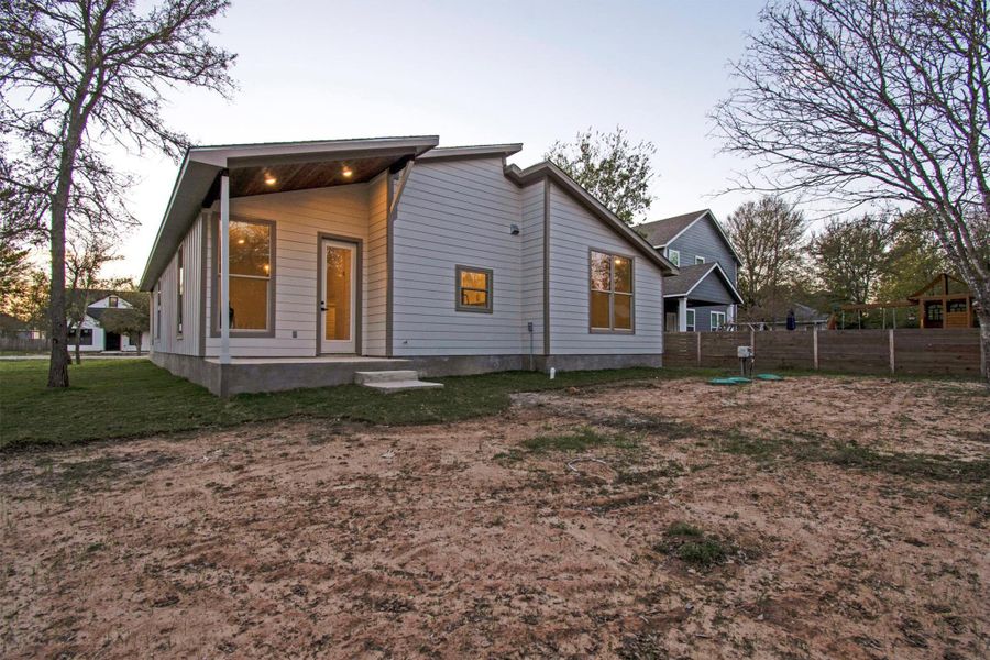 Exterior details and patio area of a home in , Bastrop (Image 24).