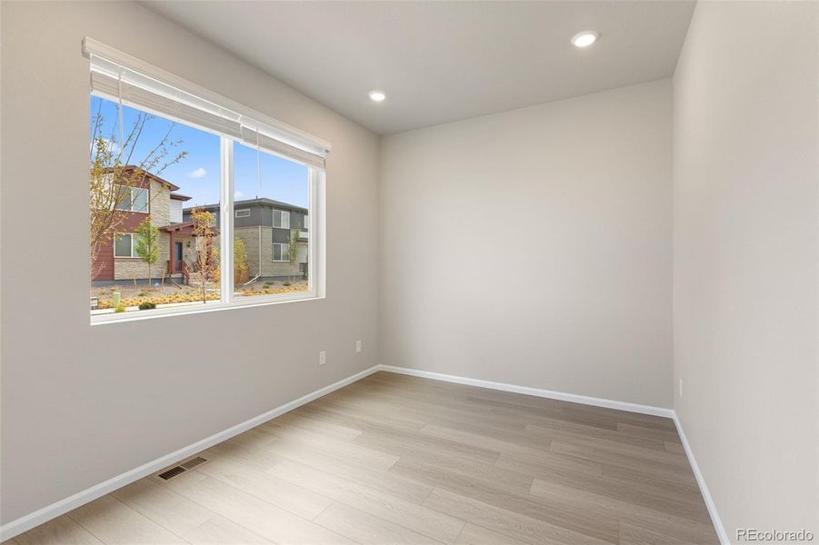 Spacious, unfurnished interior of a new home in Woodrose at Painted Prairie, Aurora (Image 30).