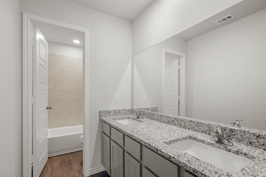 Furnished interior view inside a new home in Retreat at Fossil Creek, Fort Worth (Image 3). Furnished interior view inside a new home in Retreat at Fossil Creek, Fort Worth (Image 3).