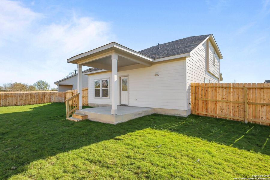 Exterior details and patio area of a home in Garden Grove, Schertz (Image 3).