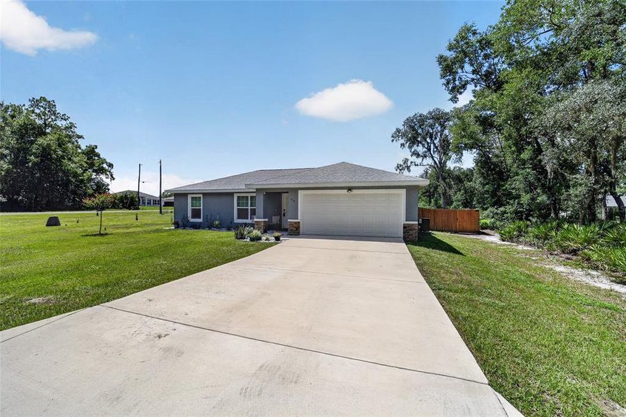 Front exterior of a new home in , Ocala, FL, highlighting curb appeal (Image 23). Front exterior of a new home in , Ocala, FL, highlighting curb appeal (Image 23).
