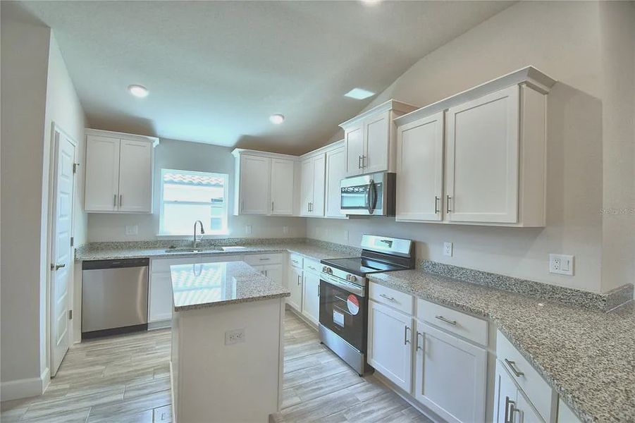 Furnished interior view inside a new home in Lake Juliana Estates, Auburndale (Image 7).