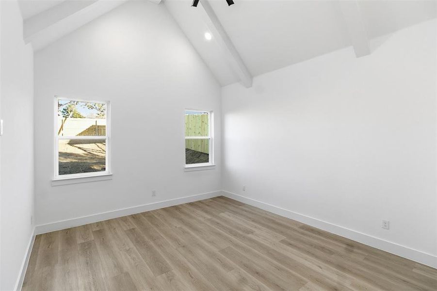Unfurnished room with light wood finished floors, recessed lighting, and a ceiling fan