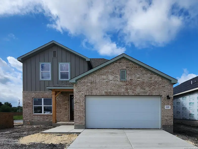 Front exterior of a new home in Nopal Valley, San Antonio, TX, highlighting curb appeal (Image 1). Front exterior of a new home in Nopal Valley, San Antonio, TX, highlighting curb appeal (Image 1).