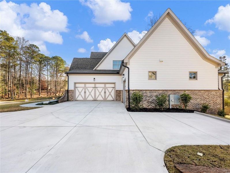 Front exterior of a new home in , Buford, GA, highlighting curb appeal (Image 2).