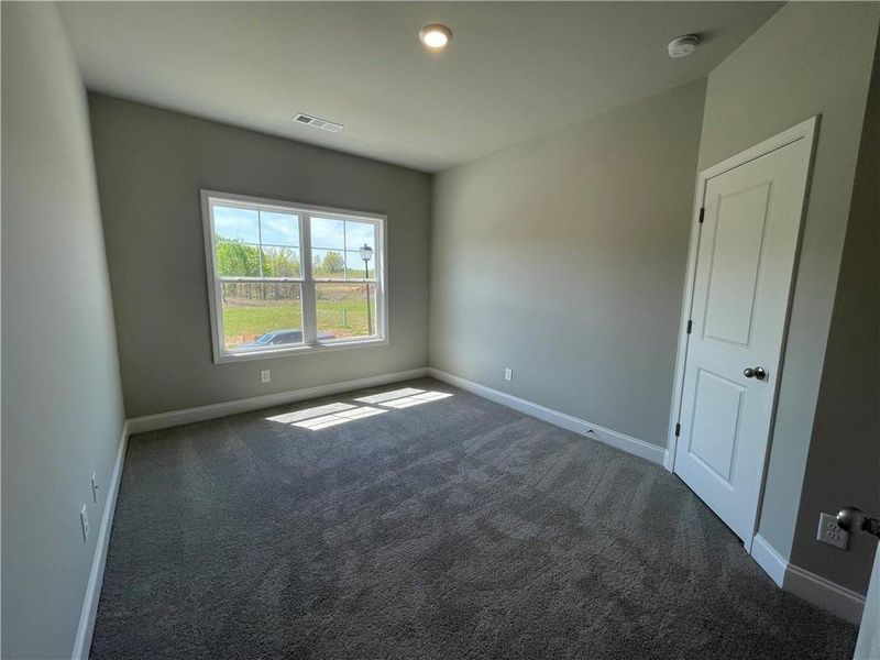 Spacious, unfurnished interior of a new home in Hidden Fields, Hoschton (Image 19). Spacious, unfurnished interior of a new home in Hidden Fields, Hoschton (Image 19).