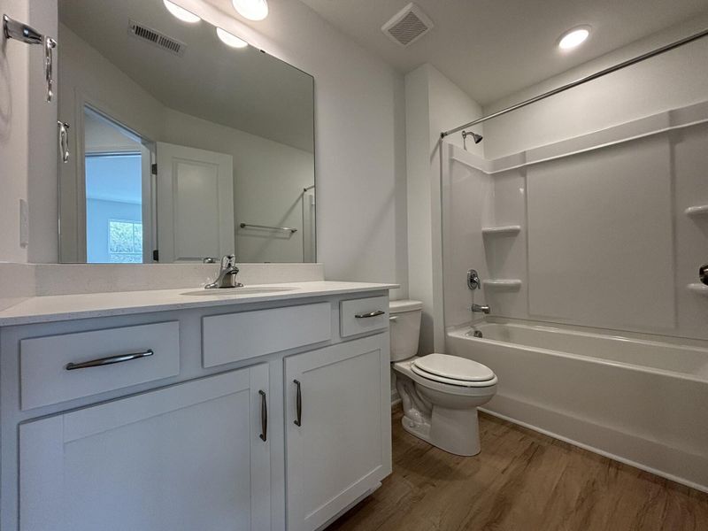 Furnished interior view inside a new home in CraigStone, Woodruff (Image 6).