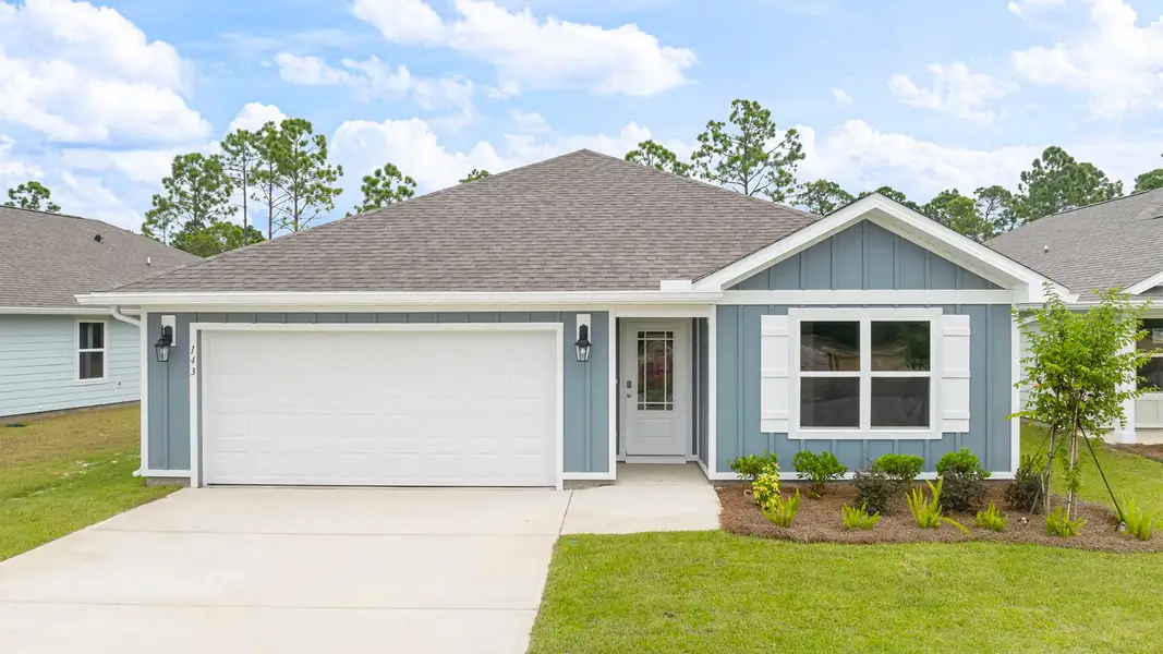 Front exterior of a new home in Palmetto Bluff, Port Saint Joe, FL, highlighting curb appeal (Image 1). Front exterior of a new home in Palmetto Bluff, Port Saint Joe, FL, highlighting curb appeal (Image 1).