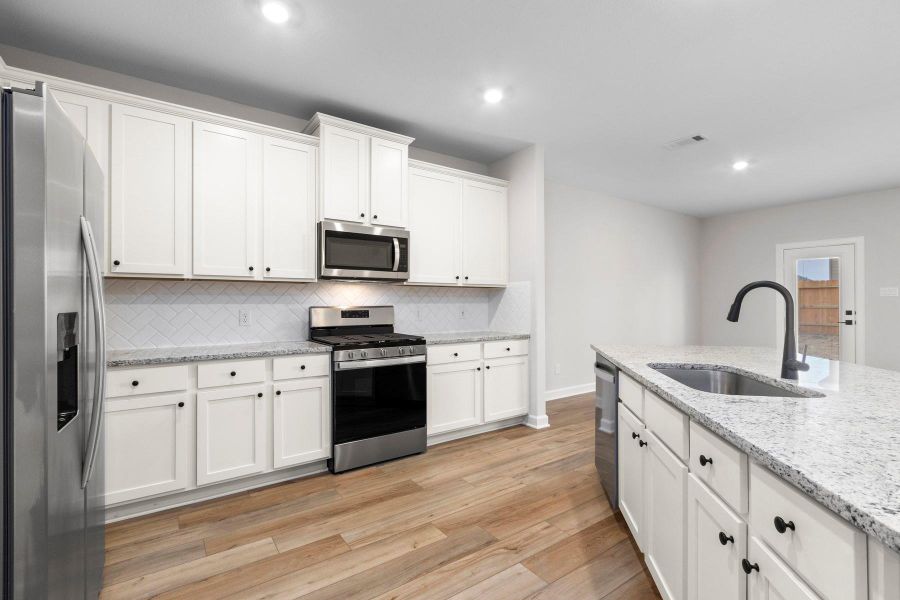 Furnished interior view inside a new home in Emberly, Beasley (Image 9).