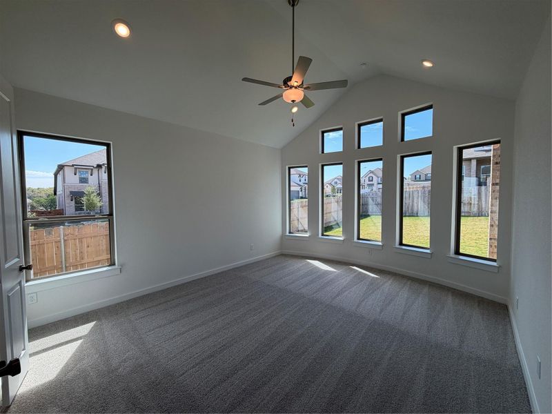 Primary Bedroom with elevated ceiling