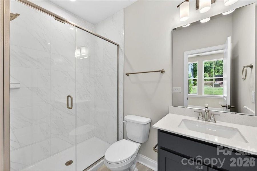 First floor full bathroom with walk-in shower First floor full bathroom with walk-in shower