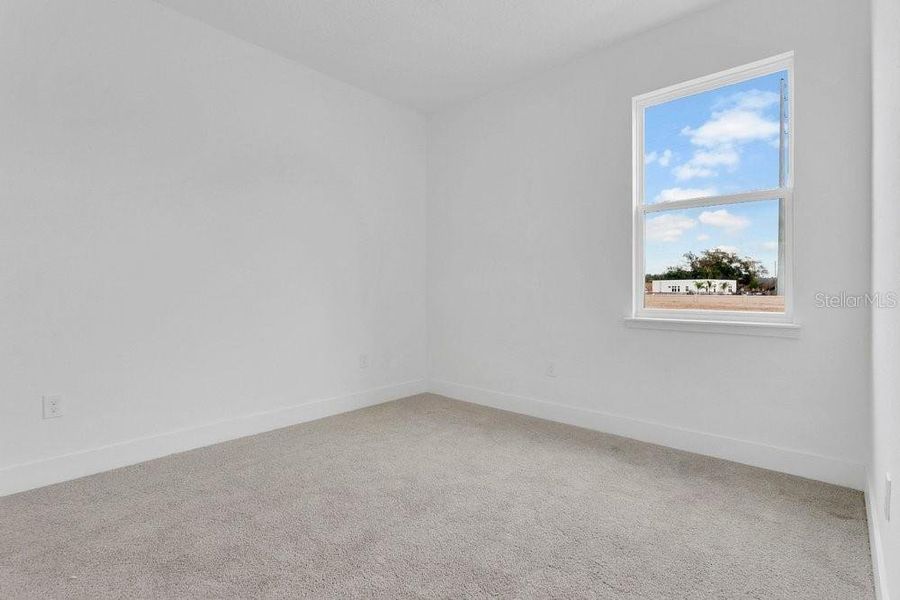 Spacious, unfurnished interior of a new home in Yucatan Gardens, Orlando (Image 12).