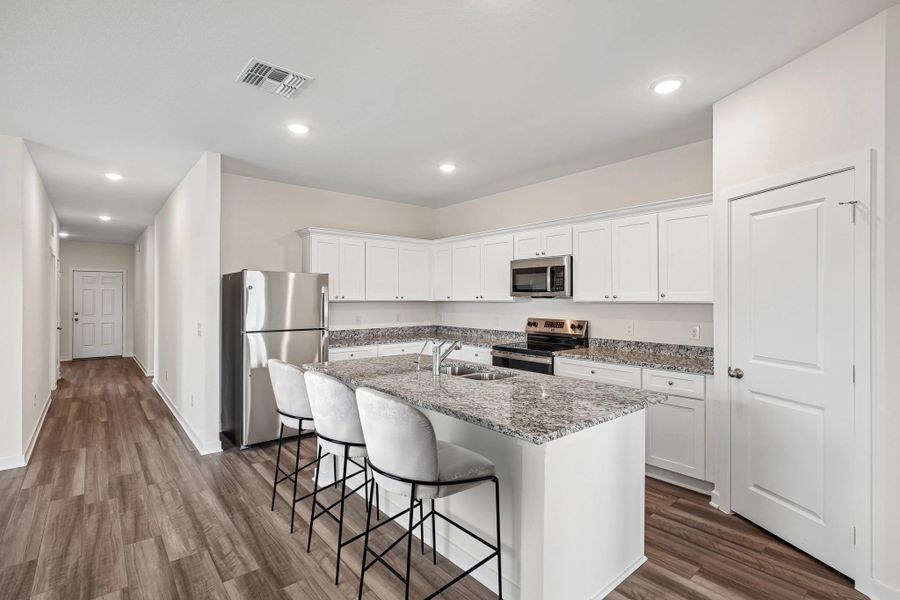 Representative furnished interior of a home built from the Prism by Starlight Homes in The Trails at Carmel, Pflugerville (Image 3). Representative furnished interior of a home built from the Prism by Starlight Homes in The Trails at Carmel, Pflugerville (Image 3).