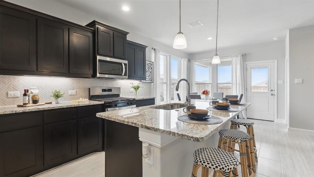 Kitchen - All Home and community information, including pricing, included features, terms, availability and amenities, are subject to change at any time without notice or obligation. All Drawings, pictures, photographs, video, square footages, floor plans, elevations, features, colors and sizes are approximate for illustration purposes only and will vary from the homes as built. Kitchen - All Home and community information, including pricing, included features, terms, availability and amenities, are subject to change at any time without notice or obligation. All Drawings, pictures, photographs, video, square footages, floor plans, elevations, features, colors and sizes are approximate for illustration purposes only and will vary from the homes as built.