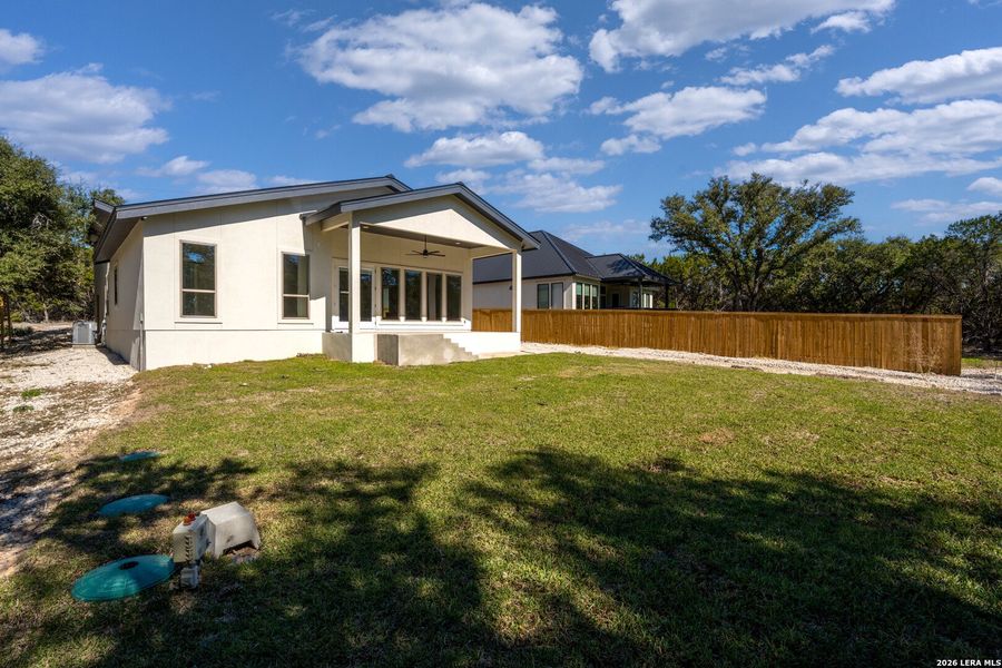 Exterior details and patio area of a home in , Spring Branch (Image 3). Exterior details and patio area of a home in , Spring Branch (Image 3).