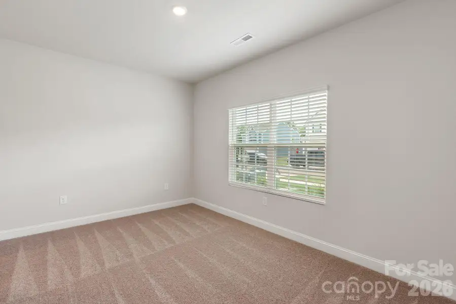 Spacious, unfurnished interior of a new home in Ascot Woods, Charlotte (Image 9).