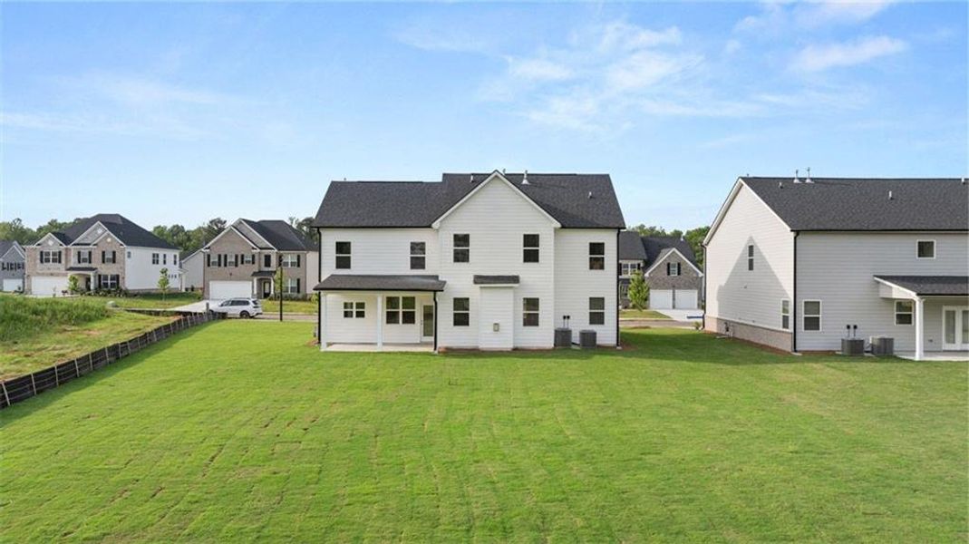 Exterior details and patio area of a home in Independence, Loganville (Image 2).