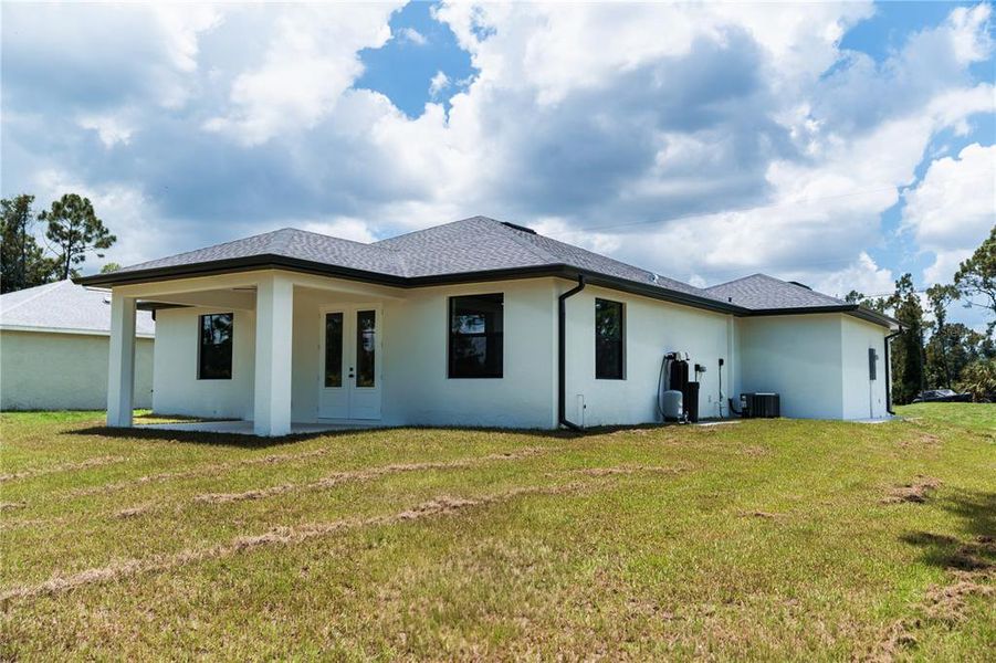 Exterior details and patio area of a home in , North Port (Image 19).