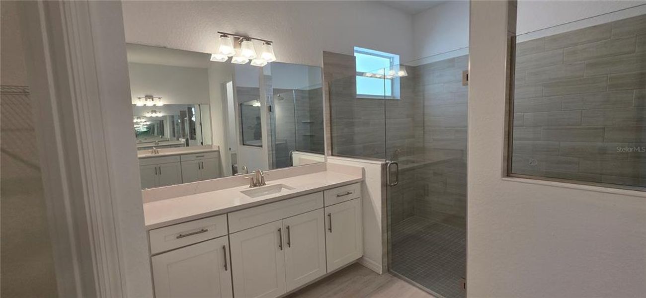 Furnished interior view inside a new home in Calusa Country Club, Lakewood Ranch (Image 8).