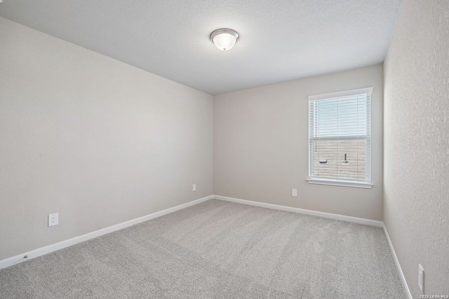 Spacious, unfurnished interior of a new home in Remington Ranch, San Antonio (Image 20).