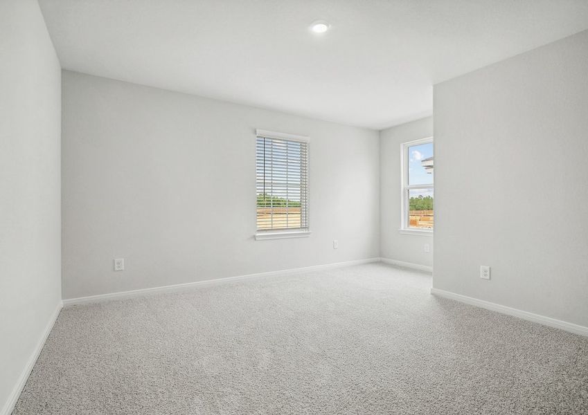 Each bedroom features lush carpet flooring Each bedroom features lush carpet flooring