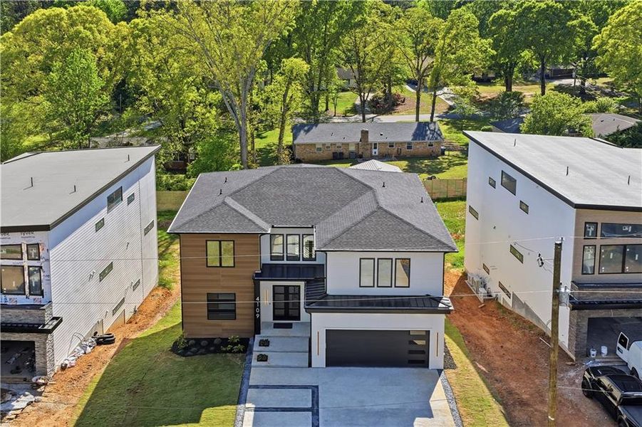 Front exterior of a new home in , Duluth, GA, highlighting curb appeal (Image 30).