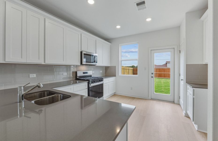 Furnished interior view inside a new home in Larson Crossing, Elgin (Image 7).