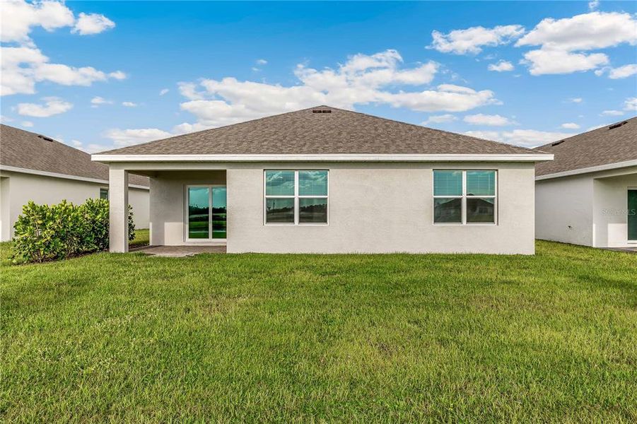 Exterior details and patio area of a home in Seagrass, Punta Gorda (Image 3).