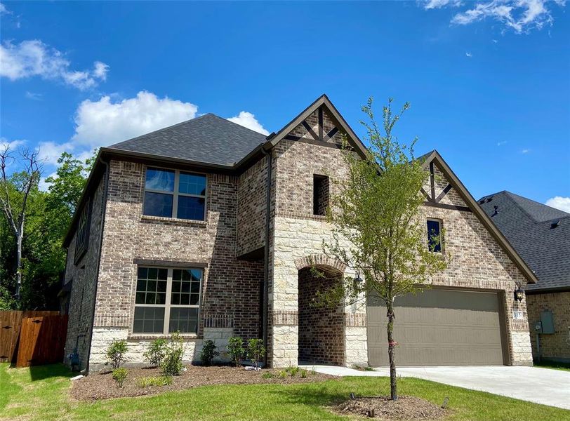Gorgeous stone & brick home with inlaid cedar has a PRIVATE back yard which backs to large trees! Gorgeous stone & brick home with inlaid cedar has a PRIVATE back yard which backs to large trees!