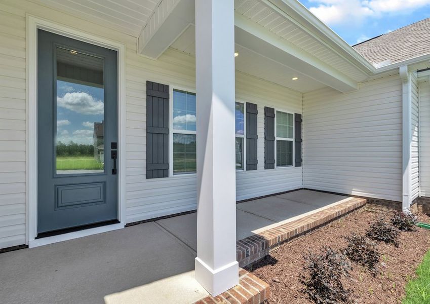 The front porch is the perfect place to enjoy a cup of coffee.