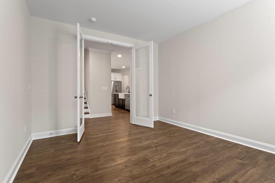 Spacious, unfurnished interior of a new home in Tidewater at Lakes of Cane Bay, Summerville (Image 15).