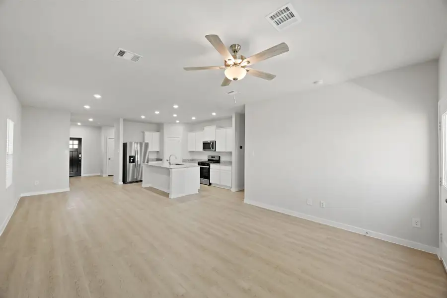 Spacious, unfurnished interior of a new home in Lonestar Collection at Paloma at Sanford Farms, Waller (Image 34).