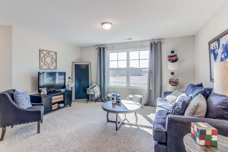 Representative furnished interior of a home built from the Drayton by Caviness & Cates Communities in Bartlett Manor, Youngsville (Image 195).