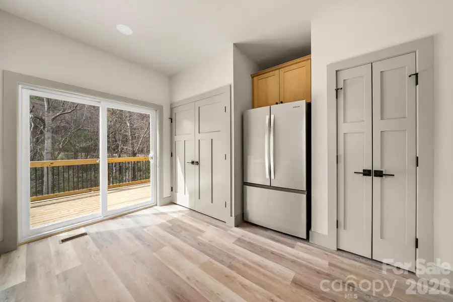 Spacious, unfurnished interior of a new home in , Asheville (Image 10).