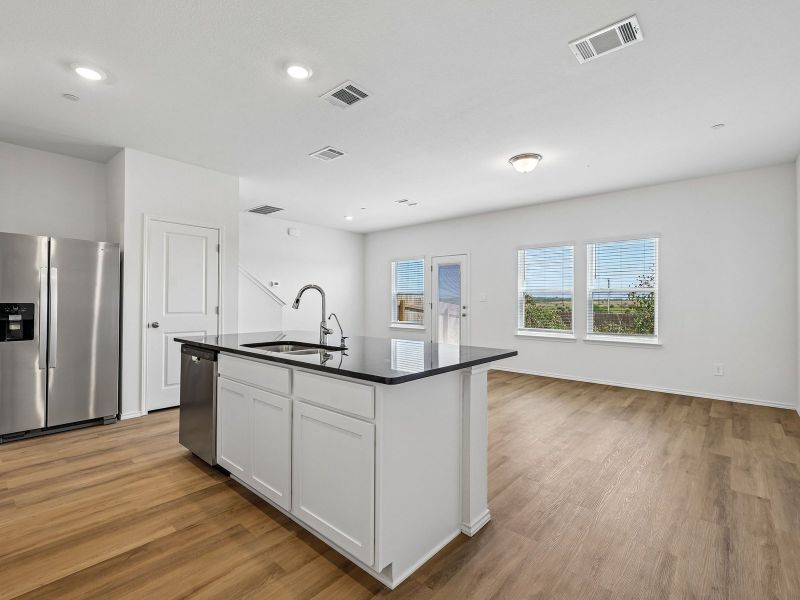 Furnished interior view inside a new home in Turner's Village, Buda (Image 4).