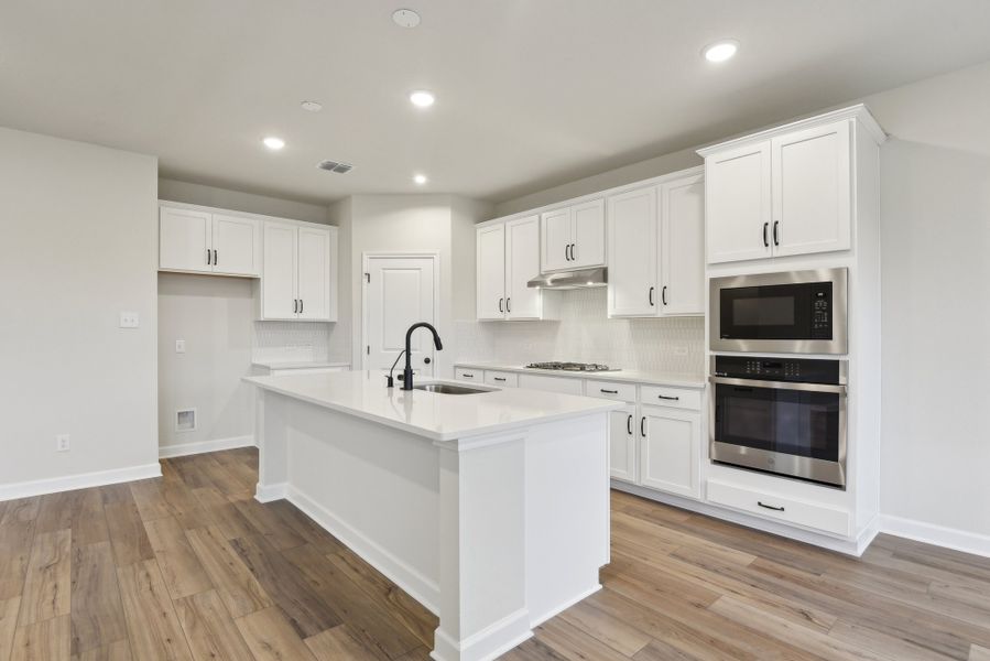 Representative furnished interior of a home built from the Makenzie by Ashton Woods in Hennersby Hollow, San Antonio (Image 4).