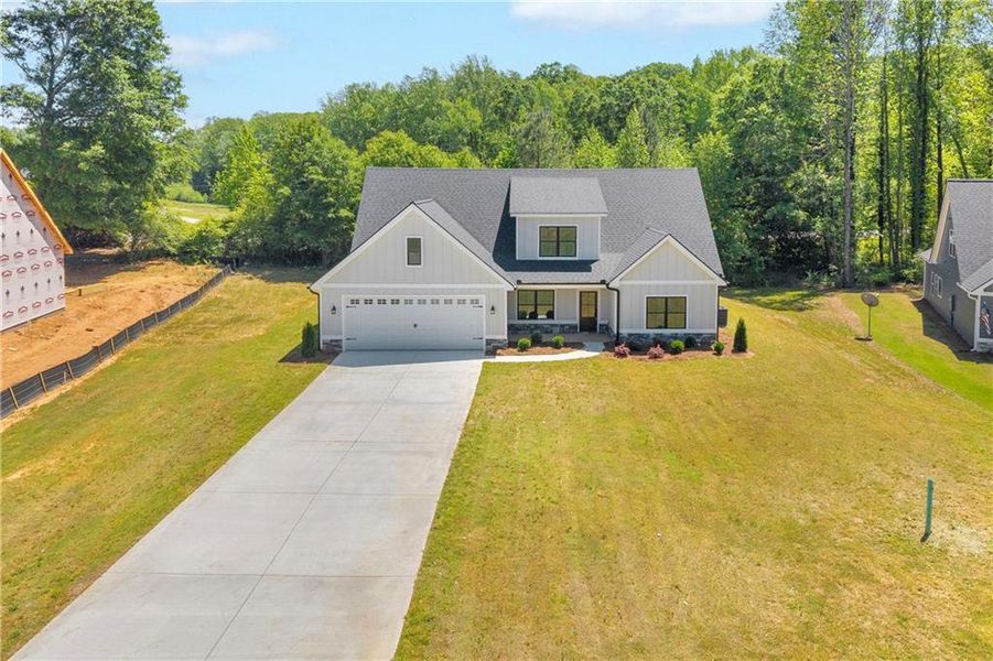 Front exterior of a new home in , Lavonia, GA, highlighting curb appeal (Image 25).