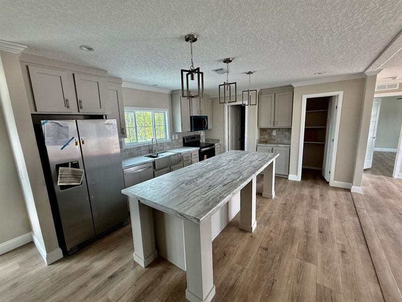 Furnished interior view inside a new home in , Okeechobee (Image 15).