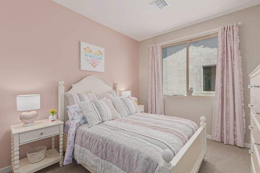 Representative furnished interior of a home built from the 2257 by Elliott Homes in Acacia at Santana, Yuma (Image 30).