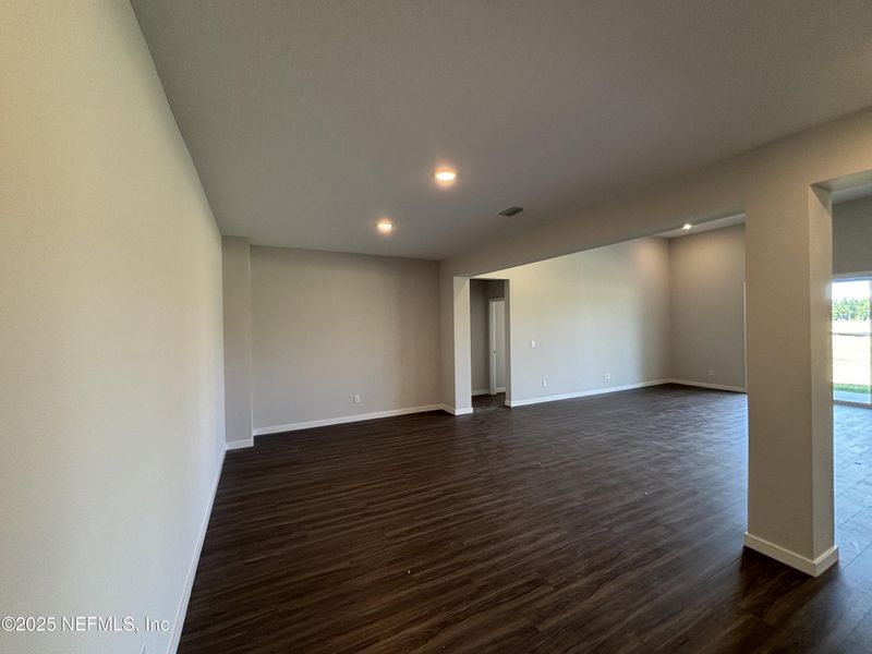 Spacious, unfurnished interior of a new home in The Cypress Series at Reserve East, Flagler Beach (Image 25).