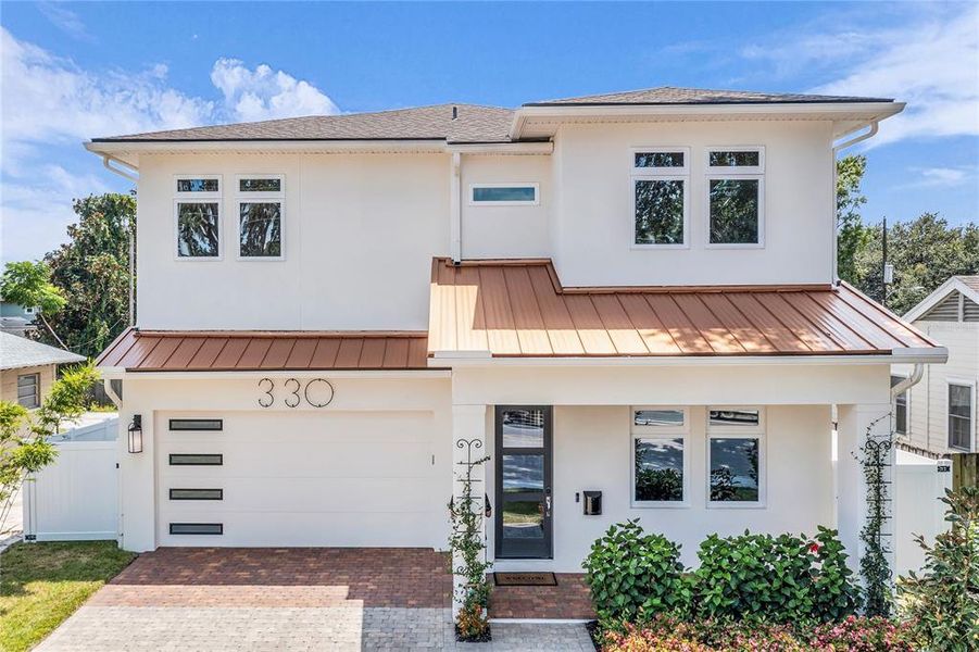Front exterior of a new home in , Orlando, FL, highlighting curb appeal (Image 2). Front exterior of a new home in , Orlando, FL, highlighting curb appeal (Image 2).