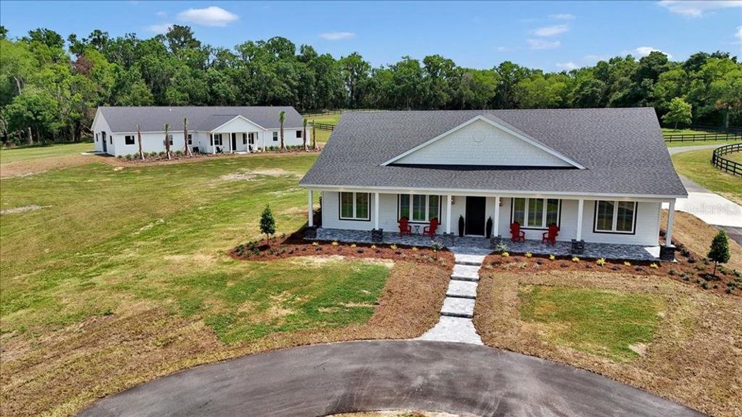 Front exterior of a new home in , Citra, FL, highlighting curb appeal (Image 25).
