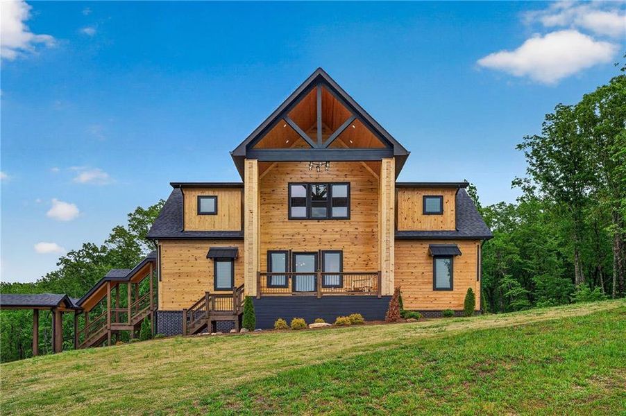 Front exterior of a new home in , Talking Rock, GA, highlighting curb appeal (Image 1). Front exterior of a new home in , Talking Rock, GA, highlighting curb appeal (Image 1).