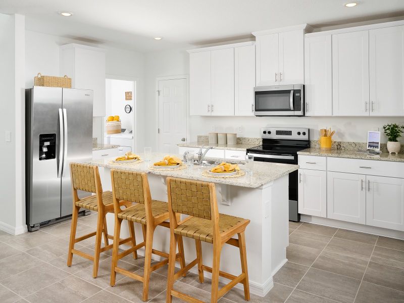 Kitchen in the Yellowstone floorplan modeled at Springs at Lake Alfred