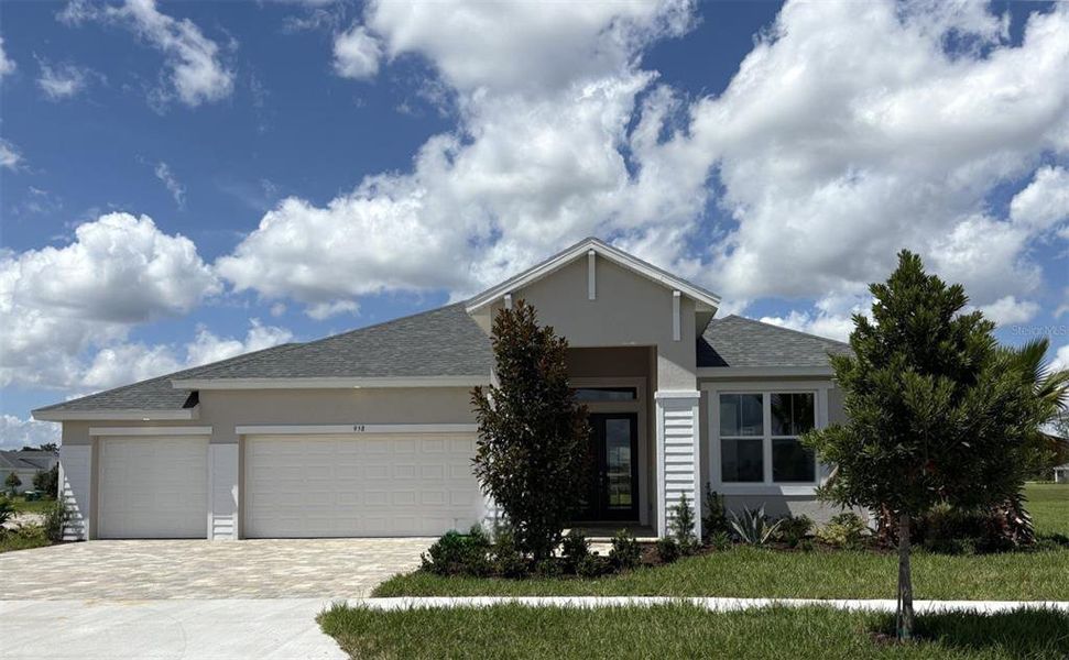 Front exterior of a new home in The Reserve at Victoria, Deland, FL, highlighting curb appeal (Image 1).