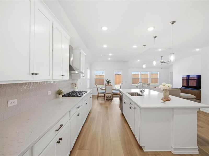 Kitchen view of single story three bedroom home with an office and a formal dining room