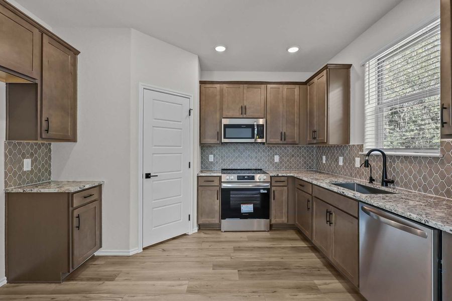 Representative furnished interior of a home built from the The Florence B by Davidson Homes LLC in Cedar Heights, San Antonio (Image 6).