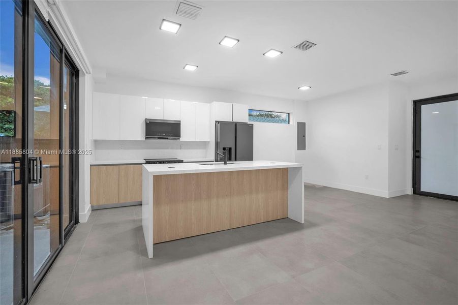 Furnished interior view inside a new home in , Miami (Image 9).